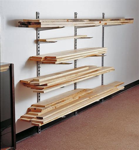 wood bracket metal wall strap holder|wall mounted lumber rack.